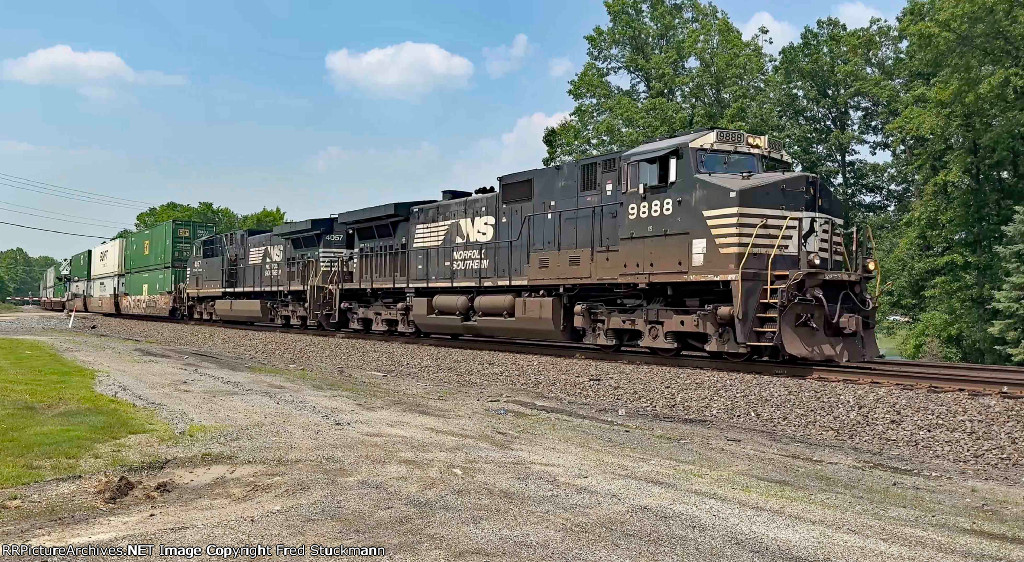 NS 9888 leads the stacks east.